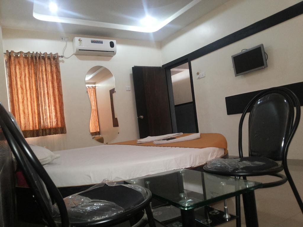 Hotel Sai Galaxy Inn Ширді Номер фото